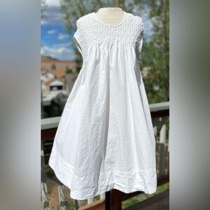 BLUE TASSEL Anthropologie White Smocked Hi-Lo Babydoll Dress